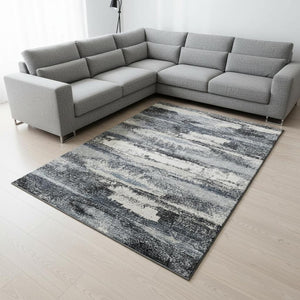 HomeRoots 8' X 10' Gray and Ivory Abstract Area Rug - Washable, UV Protected, Durable, Modern Home Decor Solution 675010