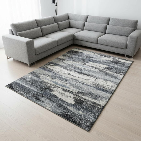 HomeRoots 8' X 10' Gray and Ivory Abstract Area Rug - Washable, UV Protected, Durable, Modern Home Decor Solution 675010