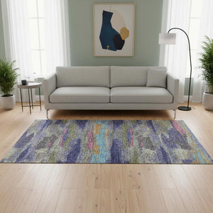 HomeRoots 5' X 8' Modern Abstract Washable Area Rug in Lavender-Pink & Orange with UV Protection & Durability 675014