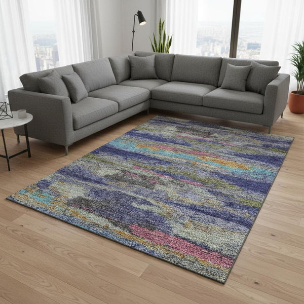 HomeRoots 9' X 12' Vibrant Lavender Pink & Orange Abstract Area Rug - Washable, UV Protected, Stylish Comfort 675017