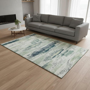 HomeRoots 9' X 12' Abstract Area Rug in Mint Green, Ivory & Blue – Washable, UV-Protected for Busy Homes 675029