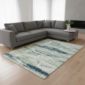 HomeRoots 10' Mint Green, Ivory, and Blue Abstract Area Rug - Washable, UV Protected, Stain Resistant, 10' x 14' 675030