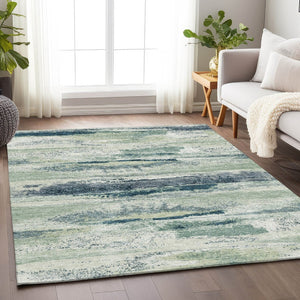 HomeRoots 10' Mint Green, Ivory, and Blue Abstract Area Rug - Washable, UV Protected, Stain Resistant, 10' x 14' 675030