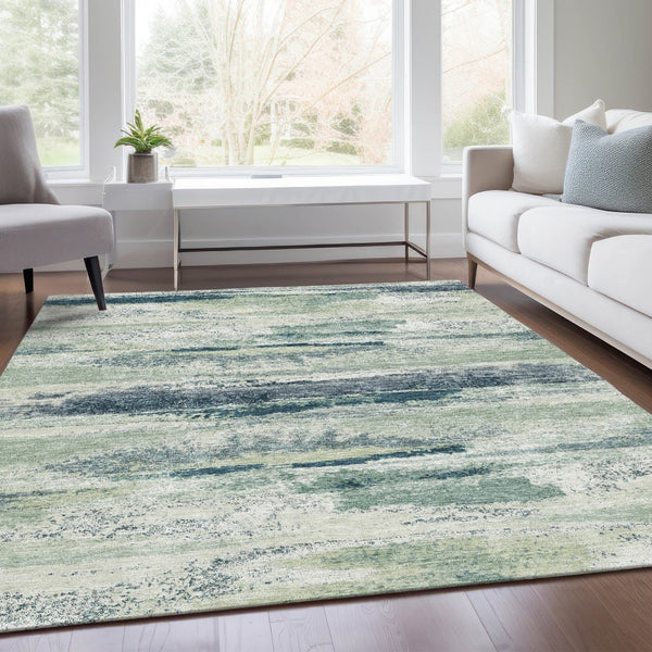 HomeRoots 10' Mint Green, Ivory, and Blue Abstract Area Rug - Washable, UV Protected, Stain Resistant, 10' x 14' 675030