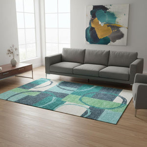HomeRoots 5' Geometric Teal, Ivory & Green Area Rug - Washable, UV-Protected, Stylish for Any Space! 675092