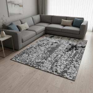 HomeRoots 9' X 12' Abstract Area Rug in Gray, Silver, and Black - Washable, UV-Protected for High-Traffic Spaces 675119