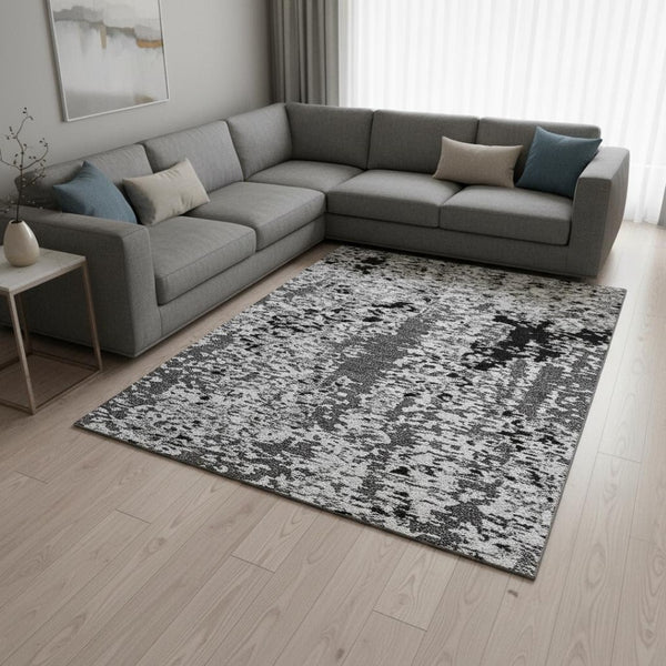 HomeRoots 9' X 12' Abstract Area Rug in Gray, Silver, and Black - Washable, UV-Protected for High-Traffic Spaces 675119