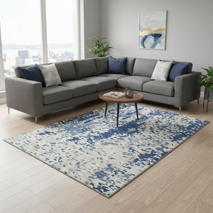 HomeRoots 9' X 12' Navy Blue and Ivory Abstract Area Rug - Washable, Stain-Resistant, UV Protected for Durability 675131