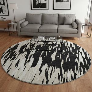 HomeRoots 8' Black And Ivory Abstract Round Rug - Washable, UV Protected, Durable & Family-Friendly Design! 675135
