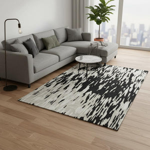HomeRoots 8' X 10' Modern Black and Ivory Abstract Washable Area Rug with UV Protection for Home Elegance 675136