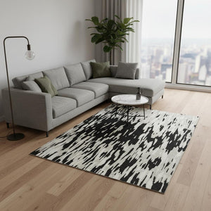 HomeRoots 9' X 12' Black And Ivory Abstract Area Rug - Washable, Stain-Resistant, UV Protected for Modern Homes 675137