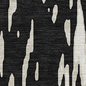 HomeRoots 10' X 14' Black And Ivory Abstract Area Rug - Stylish, Washable, UV-Protected for High-Traffic Areas 675138