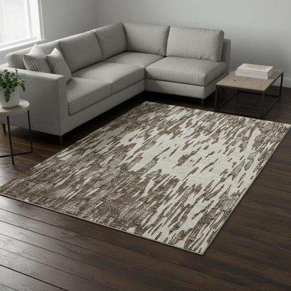 HomeRoots 9' X 12' Stylish Brown and Ivory Abstract Area Rug - Washable, UV Protected, Stain Resistant, Durable 675143