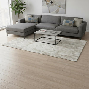 HomeRoots 8' X 10' Ivory And Beige Abstract Area Rug - Washable, UV-Protected, Stylish & Low-Maintenance Design 675172