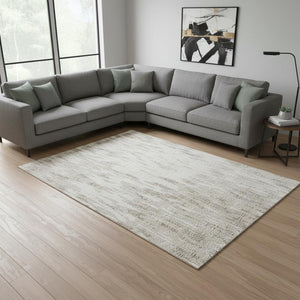 HomeRoots 10' X 14' Ivory And Beige Abstract Area Rug - Washable, UV Protected, Stain-Resistant for Modern Spaces 675174