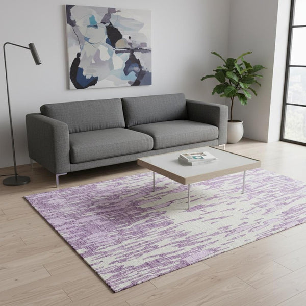 HomeRoots 5' X 8' Stylish Lavender and Ivory Abstract Washable Area Rug with Stain Resistance & UV Shield 675176