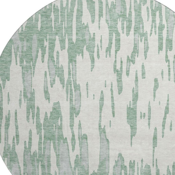 HomeRoots 8' Sage and Ivory Modern Abstract Washable Round Rug with Stain Resistance and UV Protection 675195