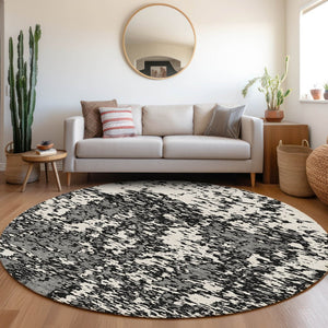 HomeRoots 8' Black And Ivory Abstract Round Rug - Washable, UV Protected, Stain Resistant for Modern Homes 675207
