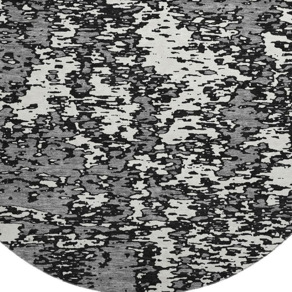 HomeRoots 8' Black And Ivory Abstract Round Rug - Washable, UV Protected, Stain Resistant for Modern Homes 675207