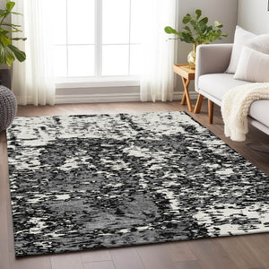 HomeRoots 8' X 10' Black And Ivory Abstract Washable Area Rug - Durable, Stylish, UV Protected for High-Traffic Homes 675208
