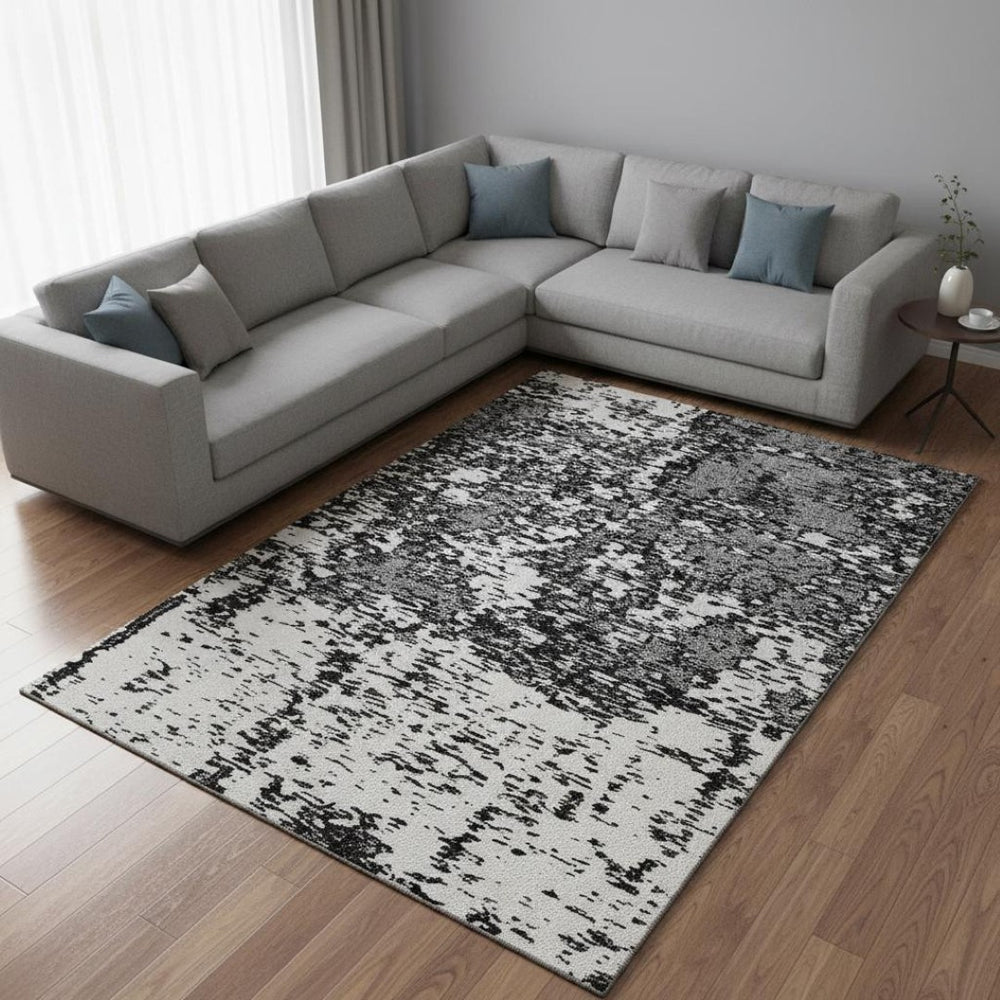 HomeRoots 9' X 12' Black and Ivory Abstract Washable Area Rug - Modern Design with UV Protection & Easy Care 675209