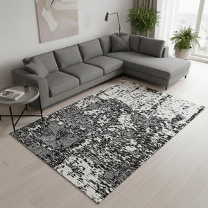 HomeRoots 10' X 14' Black And Ivory Abstract Area Rug - Washable, UV Protected, Stain Resistant, Modern Design 675210