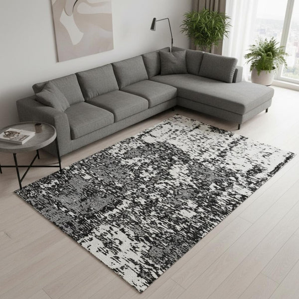 HomeRoots 10' X 14' Black And Ivory Abstract Area Rug - Washable, UV Protected, Stain Resistant, Modern Design 675210