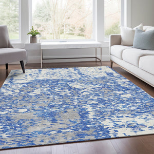 HomeRoots 8' X 10' Stylish Blue & Ivory Abstract Washable Area Rug with UV Protection for Modern Homes 675214