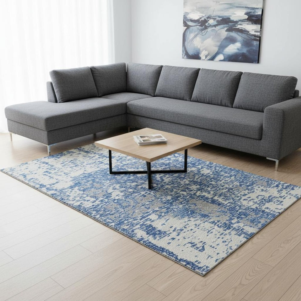 HomeRoots 9' X 12' Blue and Ivory Abstract Washable Area Rug - Durable, UV-Protected, Stylish for Any Room 675215