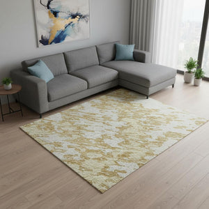 HomeRoots 9' X 12' Washable Gold and Ivory Abstract Area Rug with UV Protection for Modern Living Spaces 675239