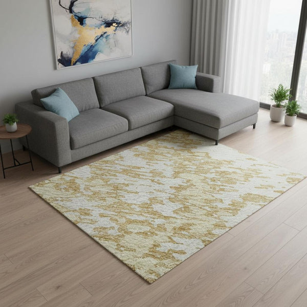 HomeRoots 9' X 12' Washable Gold and Ivory Abstract Area Rug with UV Protection for Modern Living Spaces 675239