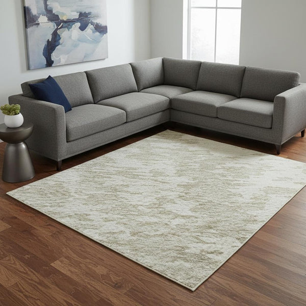 HomeRoots 9' X 12' Abstract Ivory and Beige Washable Area Rug with UV Protection for Stylish High-Traffic Spaces 675251