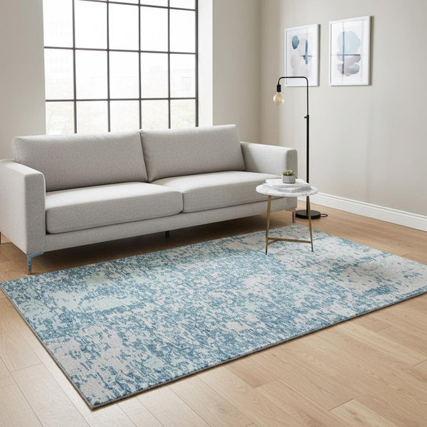 HomeRoots 5' X 8' Stylish Teal and Silver Abstract Washable Area Rug with UV Protection for Everyday Use 675266