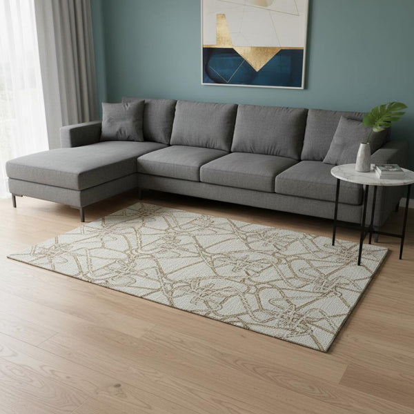HomeRoots 10' X 14' Washable Area Rug in Beige, Ivory & Brown - UV Protection, Durable & Family-Friendly Design 675282