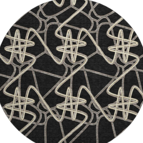 HomeRoots 8' Black and Ivory Geometric Round Rug – Stylish, Washable, UV-Protected for Modern Living Spaces 675285