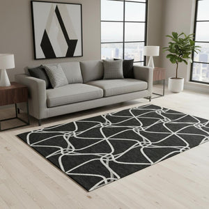 HomeRoots 5' X 8' Black And Ivory Geometric Area Rug - Stylish, Washable, UV-Protected for Busy Homes! 675350