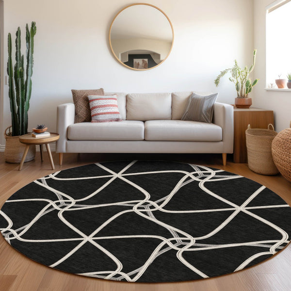 HomeRoots 8' Black And Ivory Geometric Round Rug - Washable, UV-Protected, Durable for Homes with Kids & Pets 675351