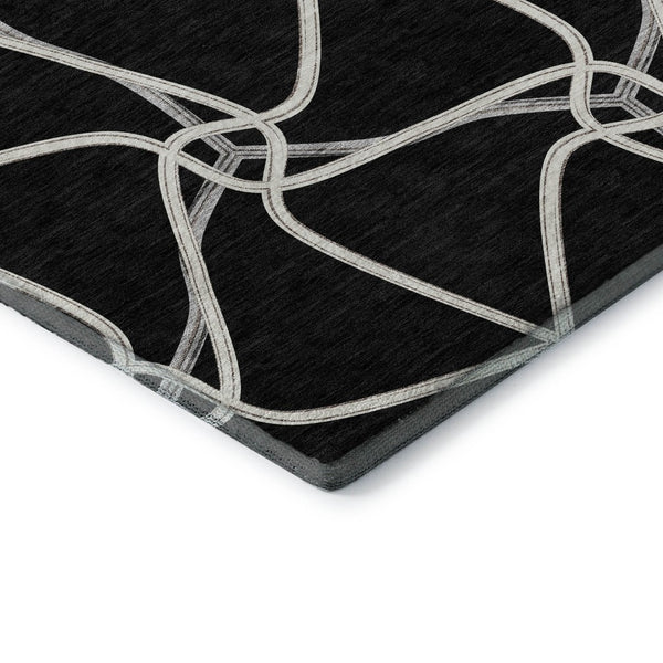 HomeRoots 8' Black And Ivory Geometric Round Rug - Washable, UV-Protected, Durable for Homes with Kids & Pets 675351