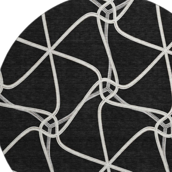 HomeRoots 8' Black And Ivory Geometric Round Rug - Washable, UV-Protected, Durable for Homes with Kids & Pets 675351