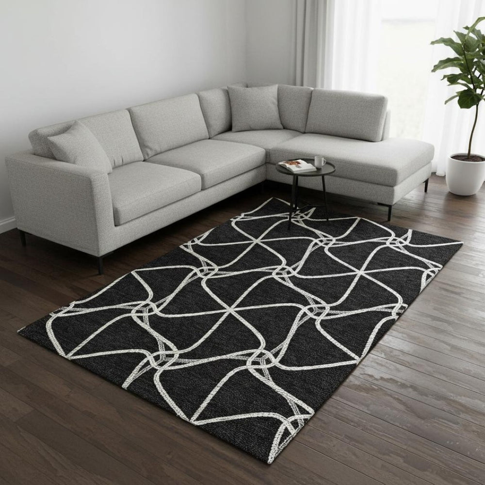 HomeRoots 9' X 12' Stylish Black and Ivory Geometric Washable Area Rug with UV Protection for High-Traffic Areas 675353