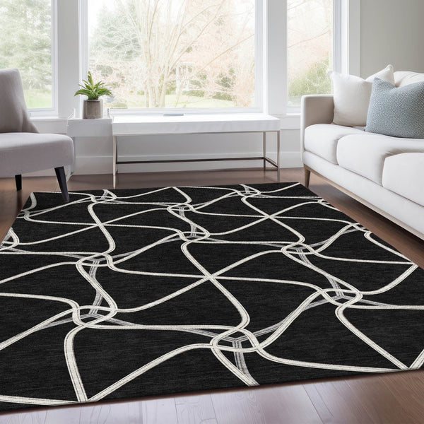 HomeRoots 9' X 12' Stylish Black and Ivory Geometric Washable Area Rug with UV Protection for High-Traffic Areas 675353