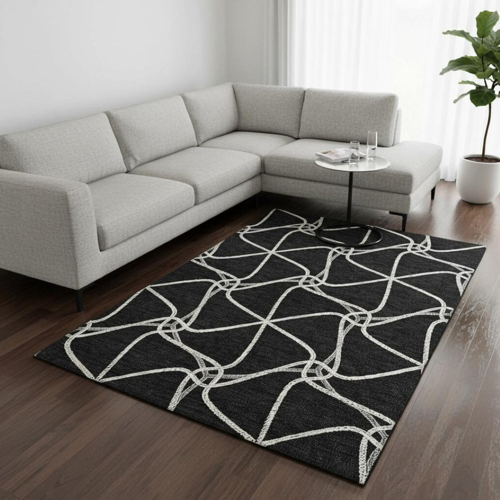 HomeRoots 10' X 14' Black And Ivory Geometric Area Rug – Washable, UV-Protected, Stain-Resistant for Busy Homes 675354