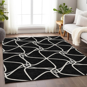HomeRoots 10' X 14' Black And Ivory Geometric Area Rug – Washable, UV-Protected, Stain-Resistant for Busy Homes 675354
