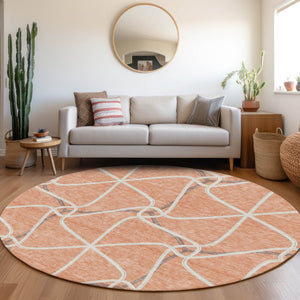 HomeRoots 8' Salmon Ivory and Gray Geometric Round Rug - Washable, UV-Protected, Family-Friendly Style! 675399