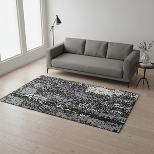 HomeRoots 5' X 8' Abstract Washable Area Rug in Black, Gray & Ivory - UV Protected, Durable & Stylish Design 675416