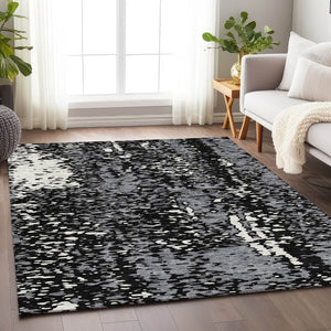 HomeRoots 5' X 8' Abstract Washable Area Rug in Black, Gray & Ivory - UV Protected, Durable & Stylish Design 675416