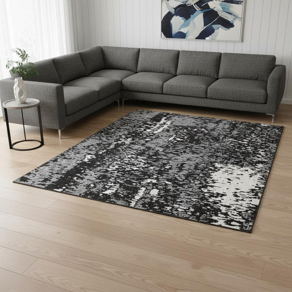 HomeRoots 8' x 10' Modern Black Gray Ivory Abstract Washable Area Rug with UV Protection for Busy Homes 675418