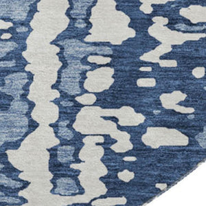HomeRoots 8' Denim Blue and Ivory Round Rug – Abstract Design, UV Protected, Stain-Resistant for High-Traffic Areas 675435