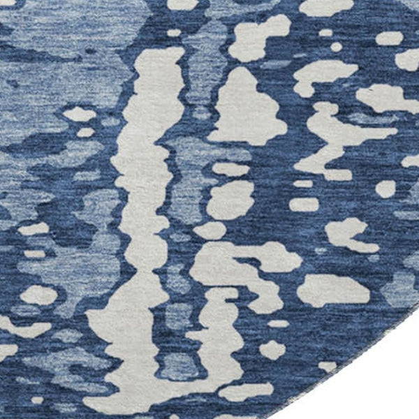 HomeRoots 8' Denim Blue and Ivory Round Rug – Abstract Design, UV Protected, Stain-Resistant for High-Traffic Areas 675435