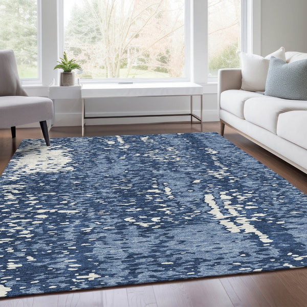 HomeRoots 8' X 10' Denim Blue & Ivory Abstract Area Rug - Washable, UV Protected, Perfect for High-Traffic Spaces 675436